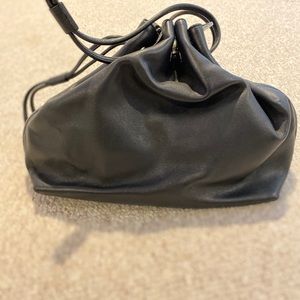 DKNY leather cinch bag with shoulder strap